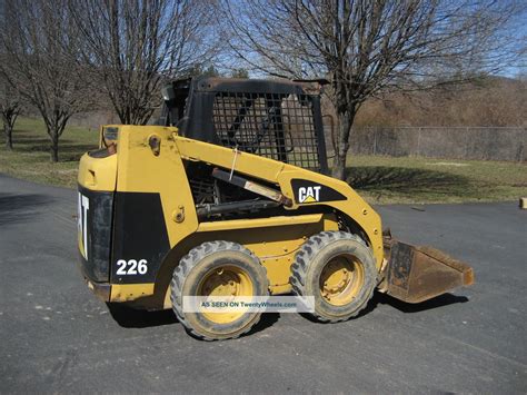 cat 226 skid steer lift capacity|caterpillar 226 skid steer door.